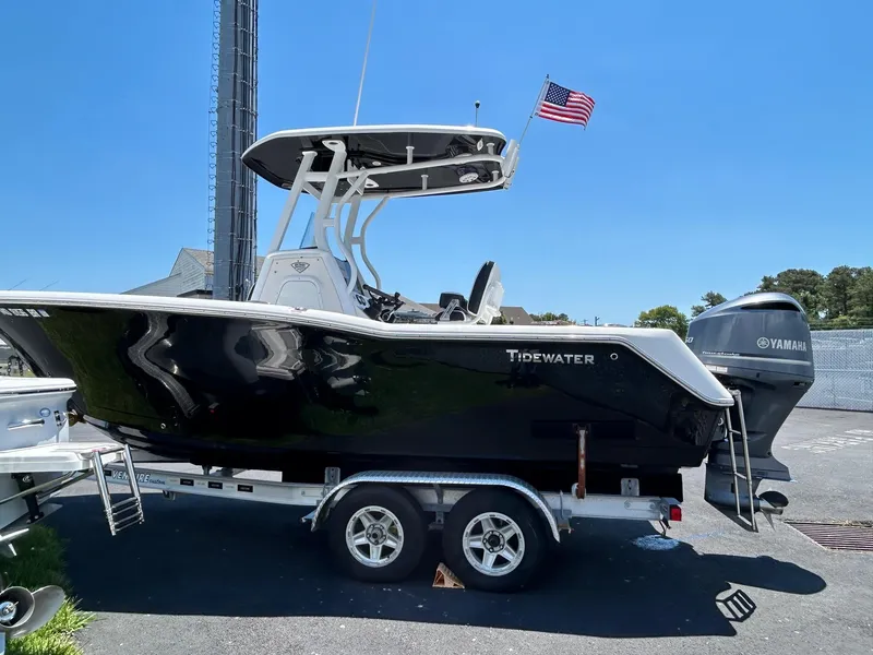 Slide: The Image of 2019 Tidewater 232 CC Adventure boat on trailer with Yamaha outboard motor. - 9