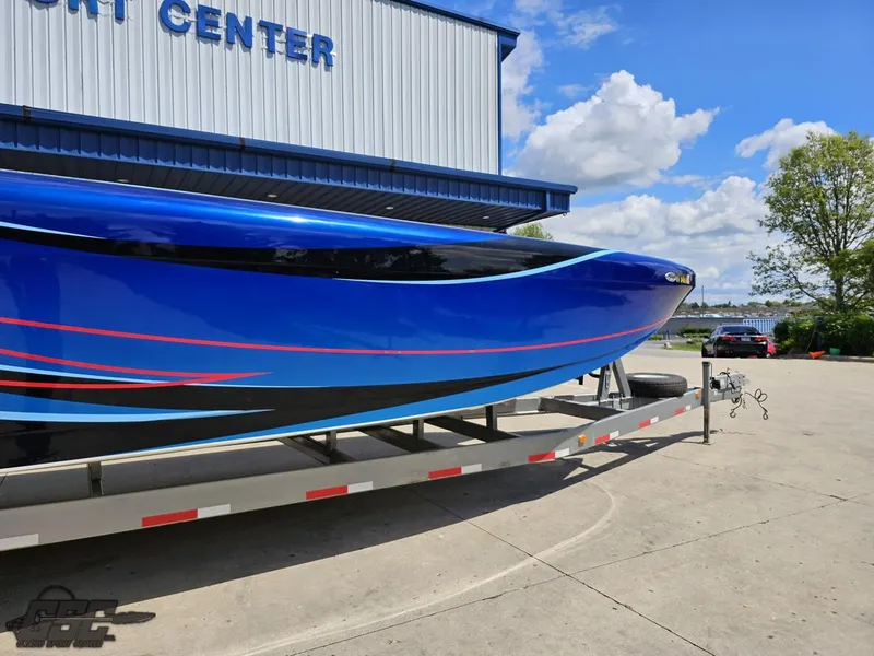Slide: The Image of 2011 Catamaran Liquid Glass 41 on trailer outside yacht center. - 14
