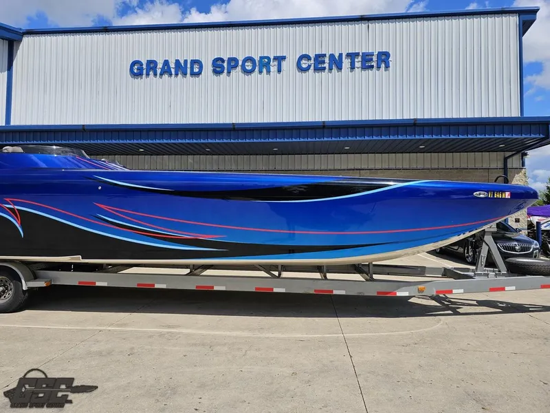 Slide: The Image of 2011 Catamaran Liquid Glass 41 boat on trailer at Grand Sport Center. - 15