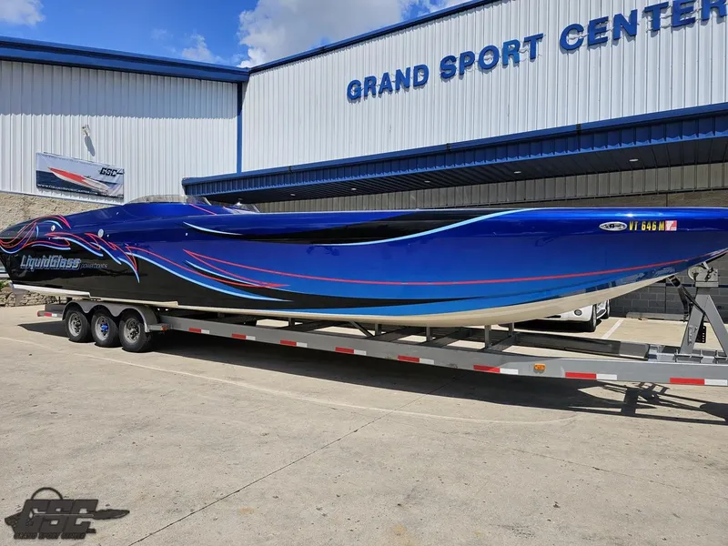 Slide: The Image of 2011 Catamaran Liquid Glass 41 boat on trailer at Grand Sport Center. - 16
