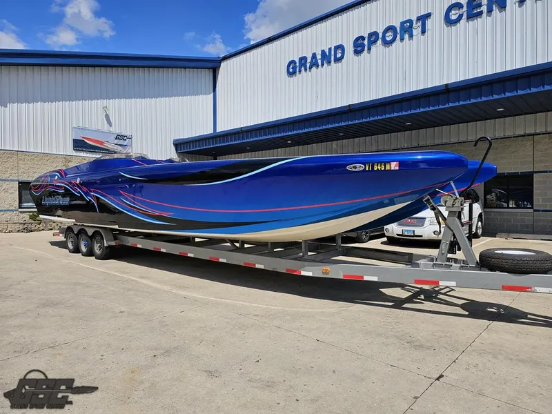 Slide: The Image of 2011 Catamaran Liquid Glass 41 boat on trailer at Grand Sport Center. - 17