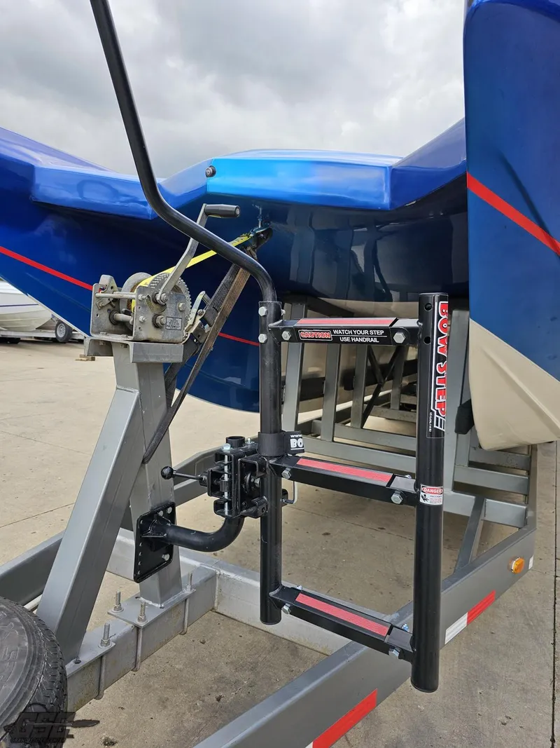 Slide: The Image of 2011 Catamaran Liquid Glass 41 on trailer, close-up of hitch and support system. - 23