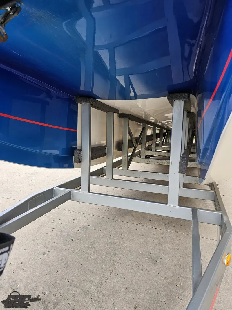 Slide: The Image of 2011 Catamaran Liquid Glass 41 on trailer, underside view. - 24