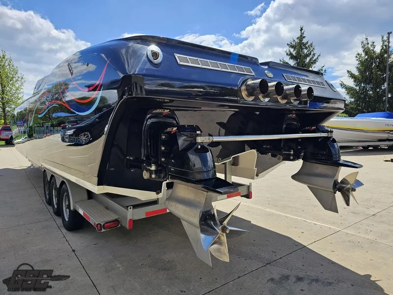 Slide: The Image of 2011 Catamaran Liquid Glass 41 with dual propellers on a trailer. - 44