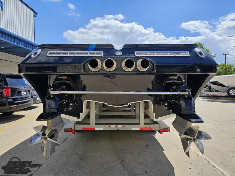 Slide: The Image of Rear view of a 2011 Catamaran Liquid Glass 41 on a trailer. - 45