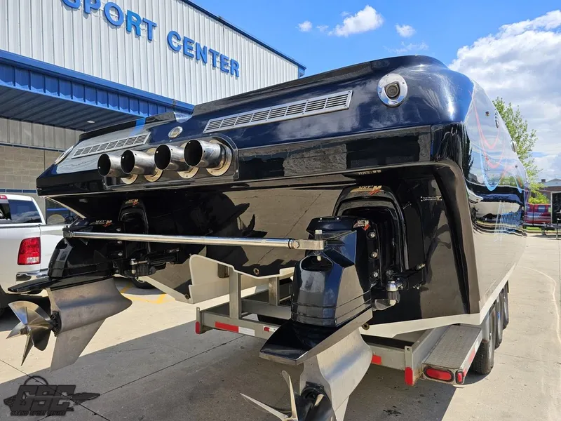 Slide: The Image of 2011 Catamaran Liquid Glass 41 on trailer at sport center, rear view. - 46