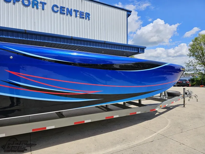 Slide: The Image of 2011 Catamaran Liquid Glass 41 boat on trailer at a transport center. - 5