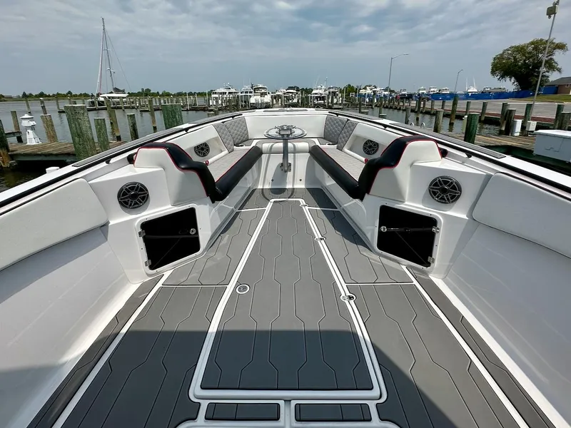 Slide: The Image of 2023 Glasstream 360 GSX Pro boat interior with seating and storage compartments. - 14