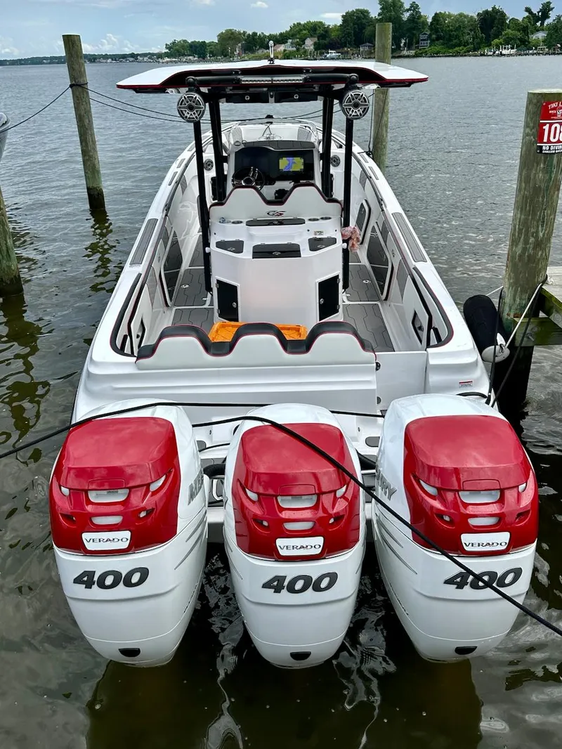 Slide: The Image of 2023 Glasstream 360 GSX Pro boat with triple 400 horsepower engines docked. - 6