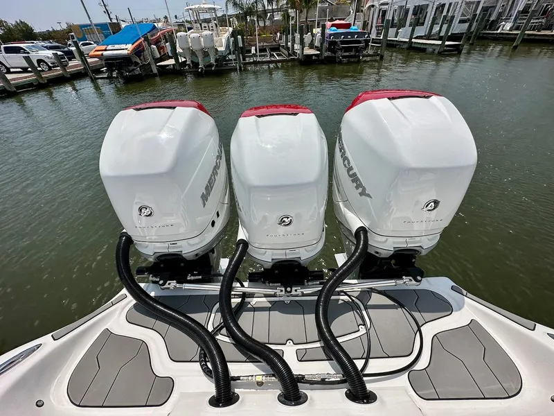 Slide: The Image of 2023 Glasstream 360 GSX Pro with triple Mercury outboard engines at dock. - 8