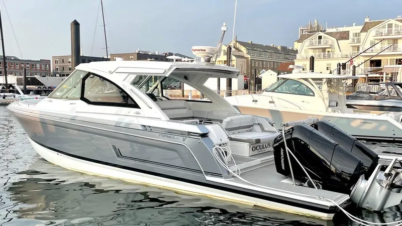 The Image of 2023 Formula 380 Super Sport Crossover OB docked at a marina. - 1