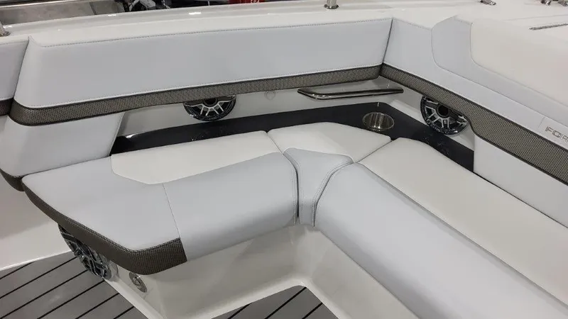 Slide: The Image of 2023 Formula 380 Super Sport Crossover OB boat interior seating area. - 15