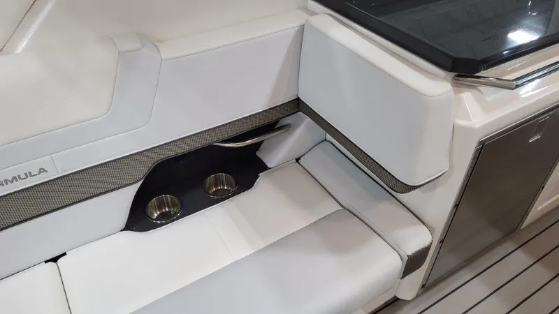 Slide: The Image of 2023 Formula 380 Super Sport Crossover OB interior seating with cup holders. - 19