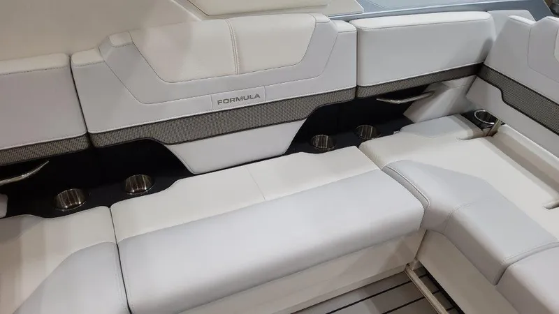 Slide: The Image of 2023 Formula 380 Super Sport Crossover OB interior seating with cup holders. - 21