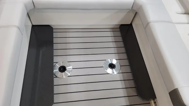 Slide: The Image of 2023 Formula 380 Super Sport Crossover OB boat interior seating and deck. - 23