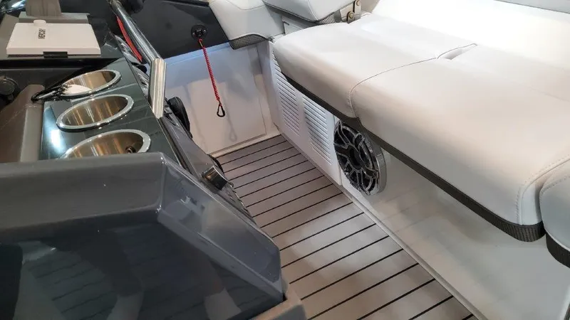 Slide: The Image of Interior of 2023 Formula 380 Super Sport Crossover OB with seating and cup holders. - 30