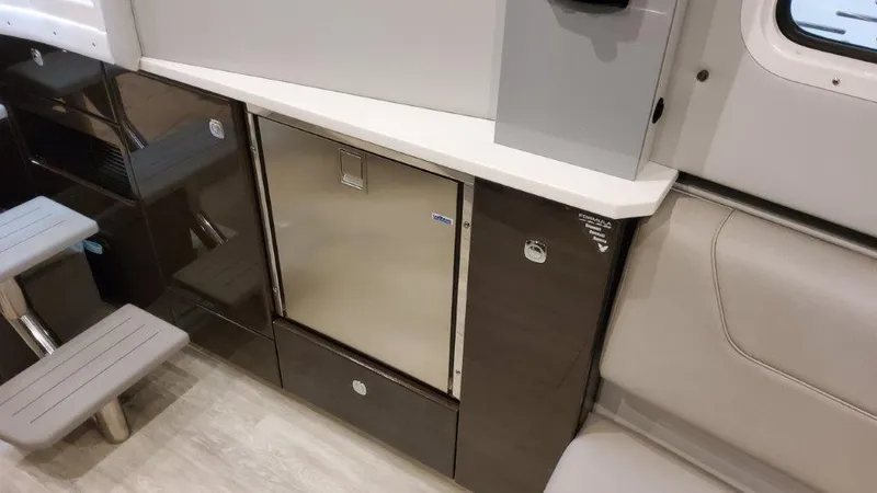 Slide: The Image of Interior of 2023 Formula 380 Super Sport Crossover OB, featuring a sleek kitchenette area. - 43