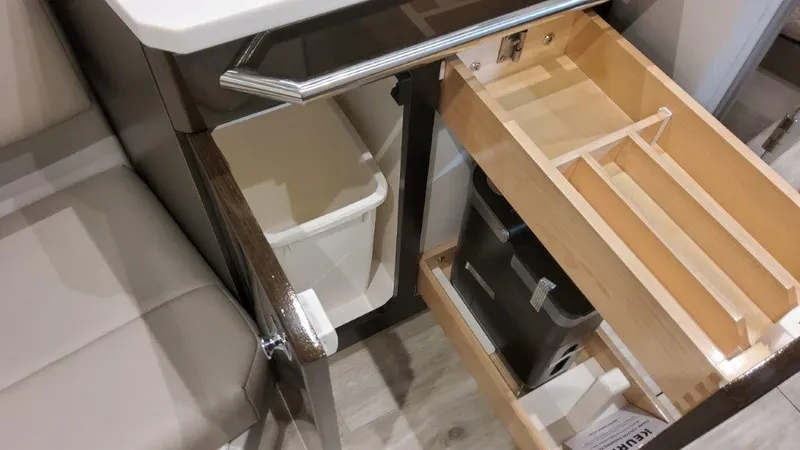 Slide: The Image of 2023 Formula 380 Super Sport Crossover OB interior with open storage compartments. - 44