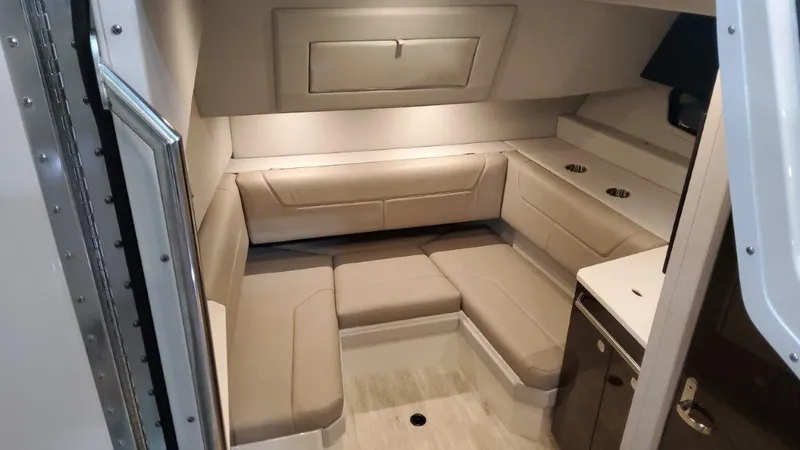 Slide: The Image of Interior cabin of 2023 Formula 380 Super Sport Crossover OB with beige seating and modern design. - 47