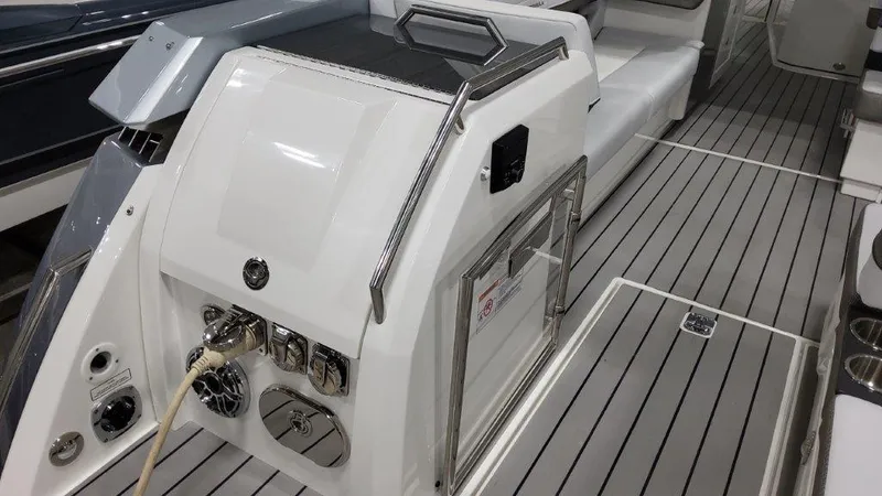 Slide: The Image of 2023 Formula 380 Super Sport Crossover OB boat interior with modern amenities. - 8