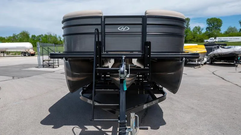 The Image of 2022 Harris CRUISER 230 SLDH pontoon boat on a trailer, front view. - 1