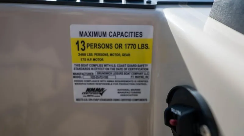 Slide: The Image of 2022 Harris CRUISER 230 SLDH boat capacity label, 13 persons or 1770 lbs limit. - 10
