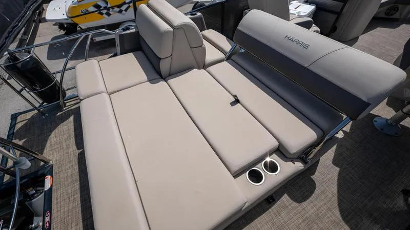 Slide: The Image of 2022 Harris CRUISER 230 SLDH boat with spacious seating and cup holders. - 15
