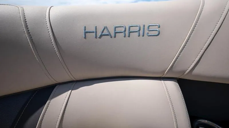 Slide: The Image of Close-up of 2022 Harris CRUISER 230 SLDH boat seat with logo. - 17