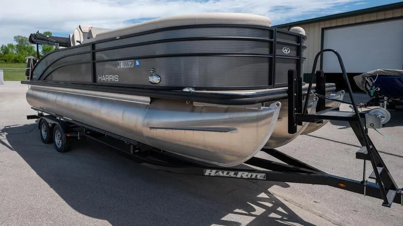 Slide: The Image of 2022 Harris CRUISER 230 SLDH pontoon boat on a Haul Rite trailer. - 3