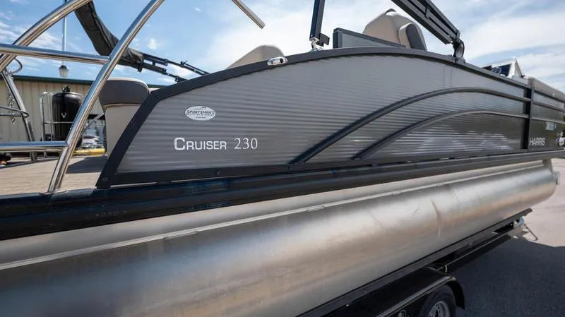 Slide: The Image of 2022 Harris CRUISER 230 SLDH pontoon boat side view on trailer. - 5