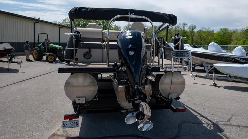 Slide: The Image of 2022 Harris CRUISER 230 SLDH pontoon boat with outboard motor, rear view. - 6