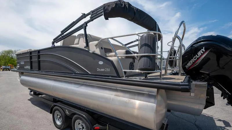 Slide: The Image of 2022 Harris CRUISER 230 SLDH pontoon boat with Mercury outboard motor. - 8