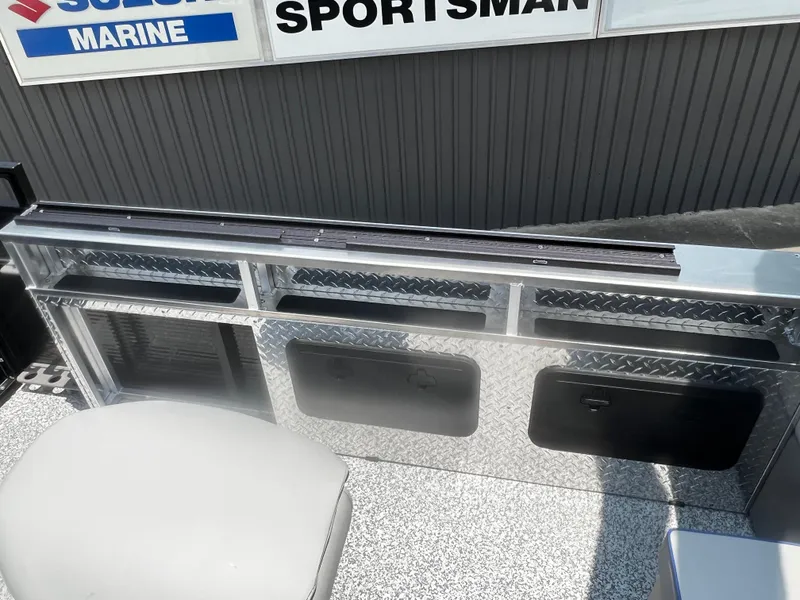 Slide: The Image of 2023 Angler Qwest 8522 Pro Family Fish boat interior with storage compartments. - 12