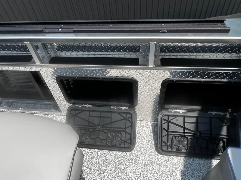 Slide: The Image of 2023 Angler Qwest 8522 Pro Family Fish storage compartments and seating area. - 13