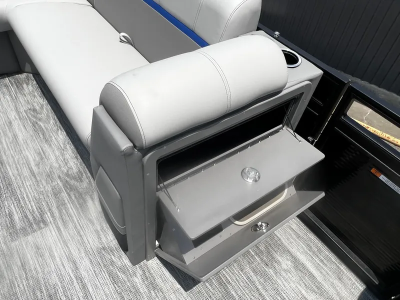 Slide: The Image of 2023 Angler Qwest 8522 Pro Family Fish boat interior with storage compartment and seating. - 4