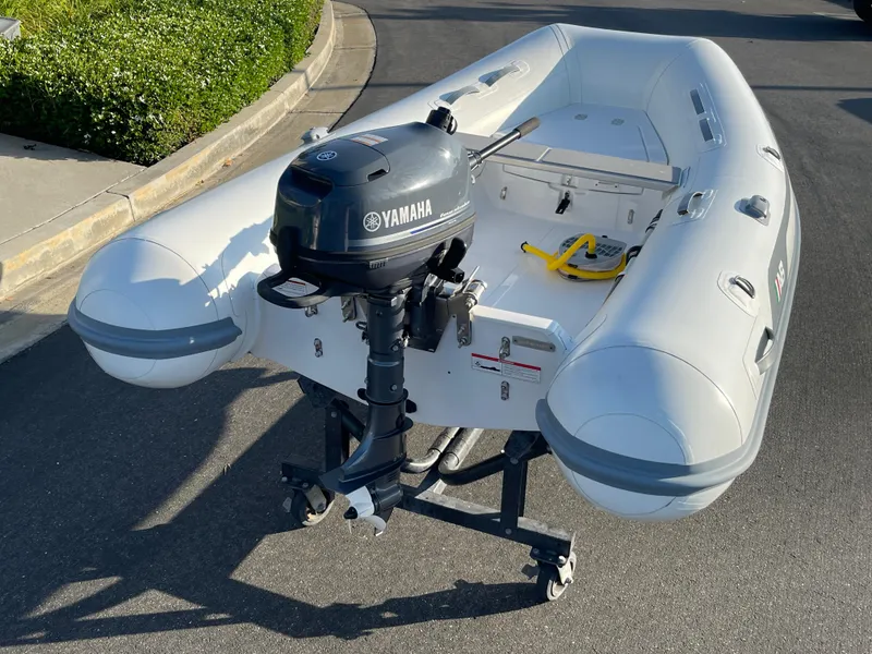 Slide: The Image of 2019 AB Inflatables Navigo 9 VS with Yamaha outboard motor on a trailer. - 3