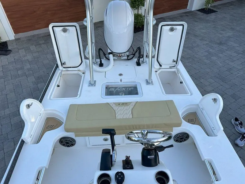 Slide: The Image of 2022 Blacktip Boatworks 18 Flats boat interior with open storage compartments. - 14