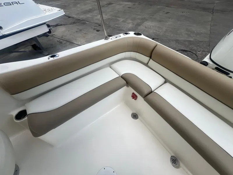 Slide: The Image of 2014 Key West 203 DFS boat with beige and white seating. - 17