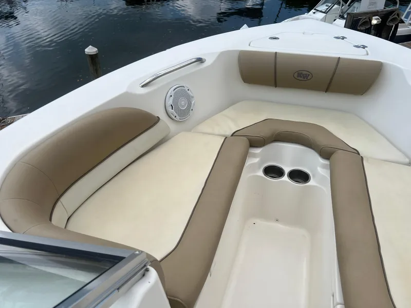 Slide: The Image of 2014 Key West 203 DFS boat interior with beige and white seating. - 8