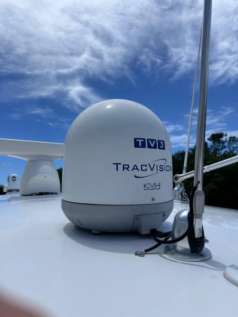 Slide: The Image of KVH TracVision TV3 satellite dome on 2016 Intrepid 375 Walkaround boat. - 12