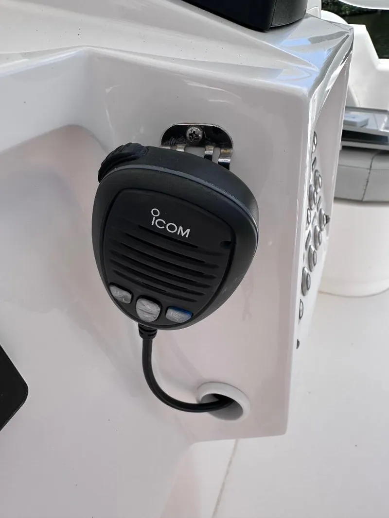 Slide: The Image of ICOM radio microphone on a 2016 Intrepid 375 Walkaround boat. - 21