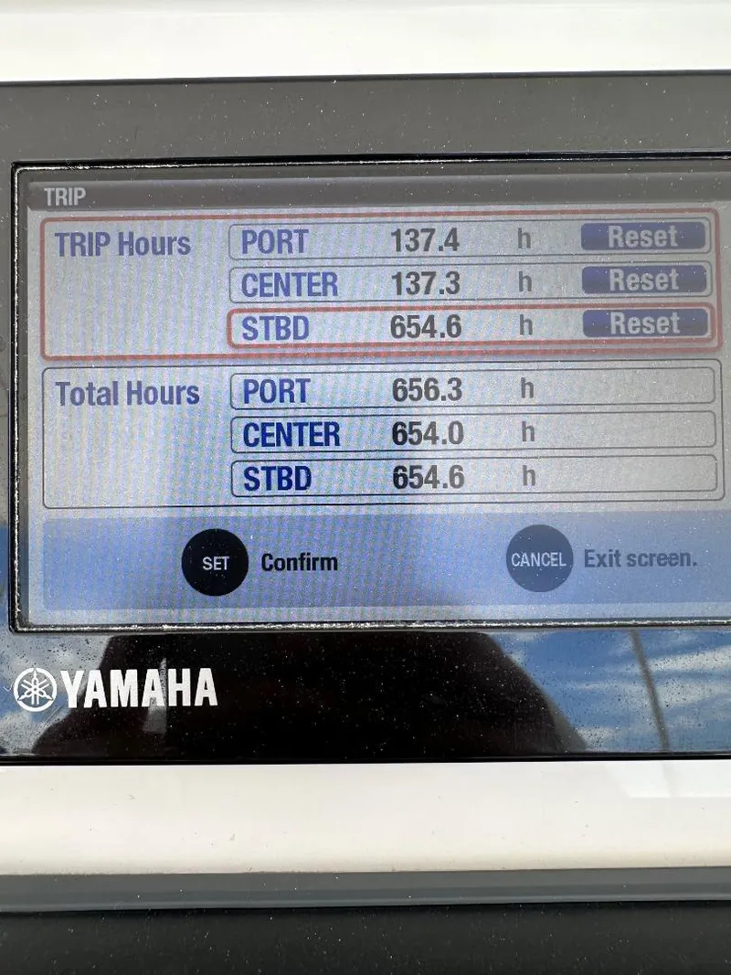 Slide: The Image of Yamaha engine hours display on a 2016 Intrepid 375 Walkaround boat. - 22