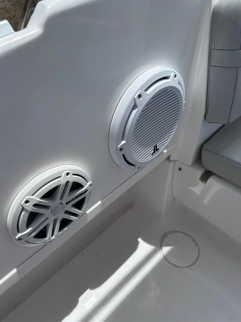 Slide: The Image of 2016 Intrepid 375 Walkaround boat interior with built-in speakers. - 24