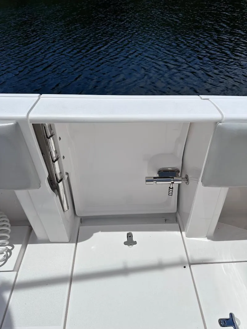 Slide: The Image of 2016 Intrepid 375 Walkaround boat deck with water view. - 27