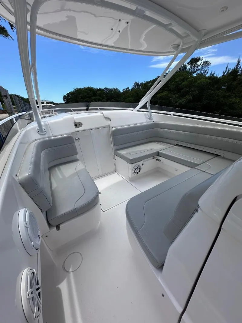 Slide: The Image of 2016 Intrepid 375 Walkaround boat with spacious seating and modern design. - 3