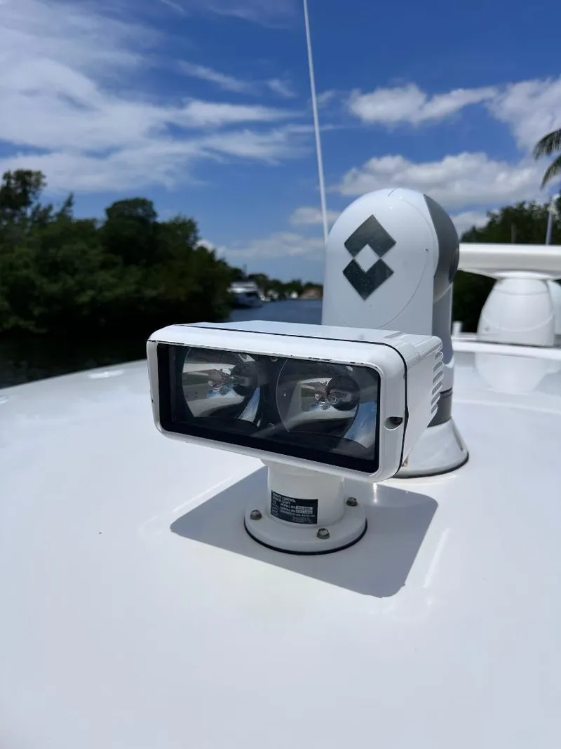Slide: The Image of Close-up of spotlight on 2016 Intrepid 375 Walkaround boat. - 33