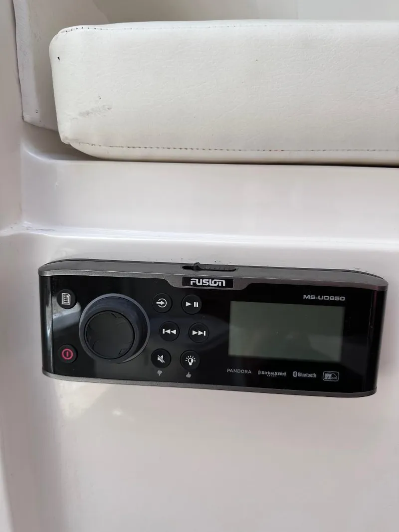 Slide: The Image of Fusion marine stereo system on a 2016 Intrepid 375 Walkaround boat. - 38