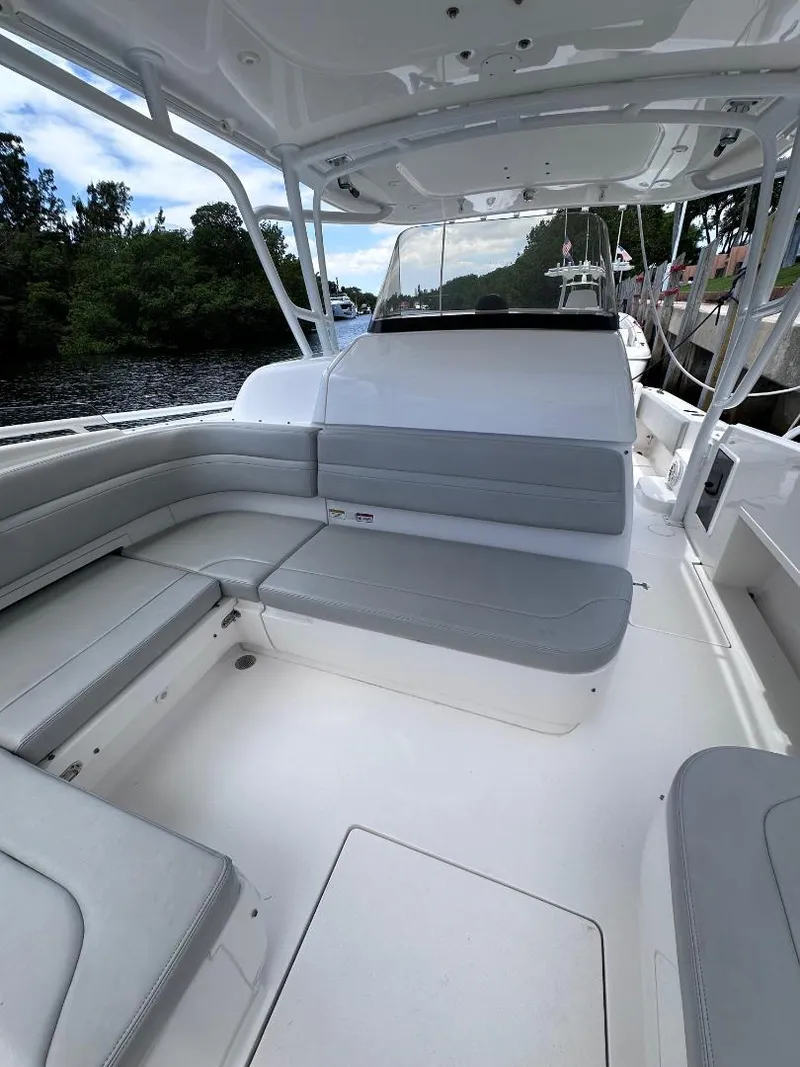 Slide: The Image of 2016 Intrepid 375 Walkaround boat with spacious seating and sleek design. - 4