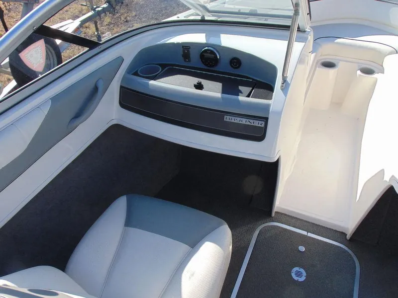 Slide: The Image of 2013 Bayliner 185 Bowrider interior with seating and dashboard. - 4