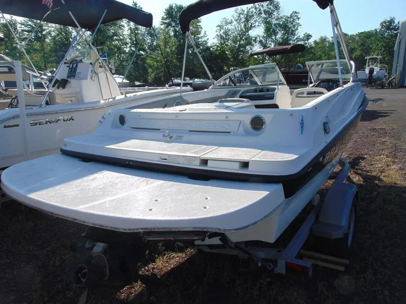 Slide: The Image of 2013 Bayliner 185 Bowrider boat on trailer, rear view. - 7